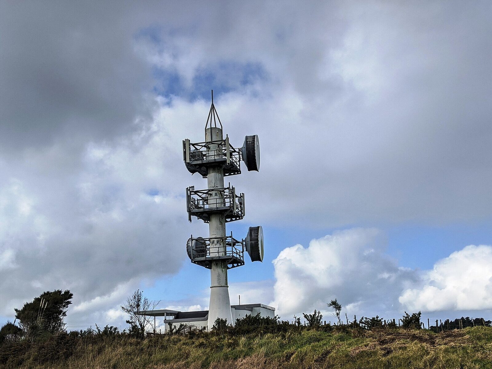 Telecoms networks telecommunications mast with dish antennas
